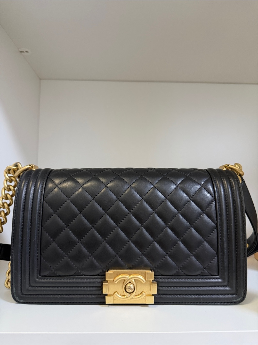 CHANEL Black Quilted Boy Bag with Gold Hardware and Chain